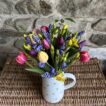 A bunch of scented mixed Narcissi, blue Cornish Scillas and pretty mixed colour tulips. Vase not included.