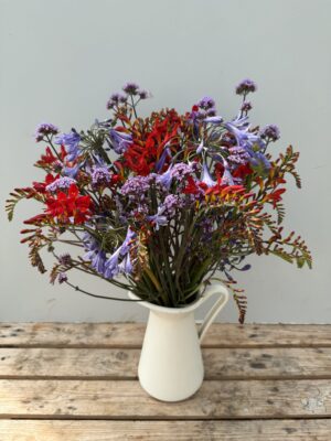 A jug of Agapanthus, Crocosmia & Verbena